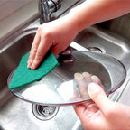 Multi-purpose aqua green cleaning pads, shown ready for deep scrubbing.