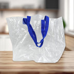 Multipurpose transparent bag used for carrying groceries.
