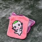 Detailed view of the cute cartoon design on the Pink Hot Water Bag cover.