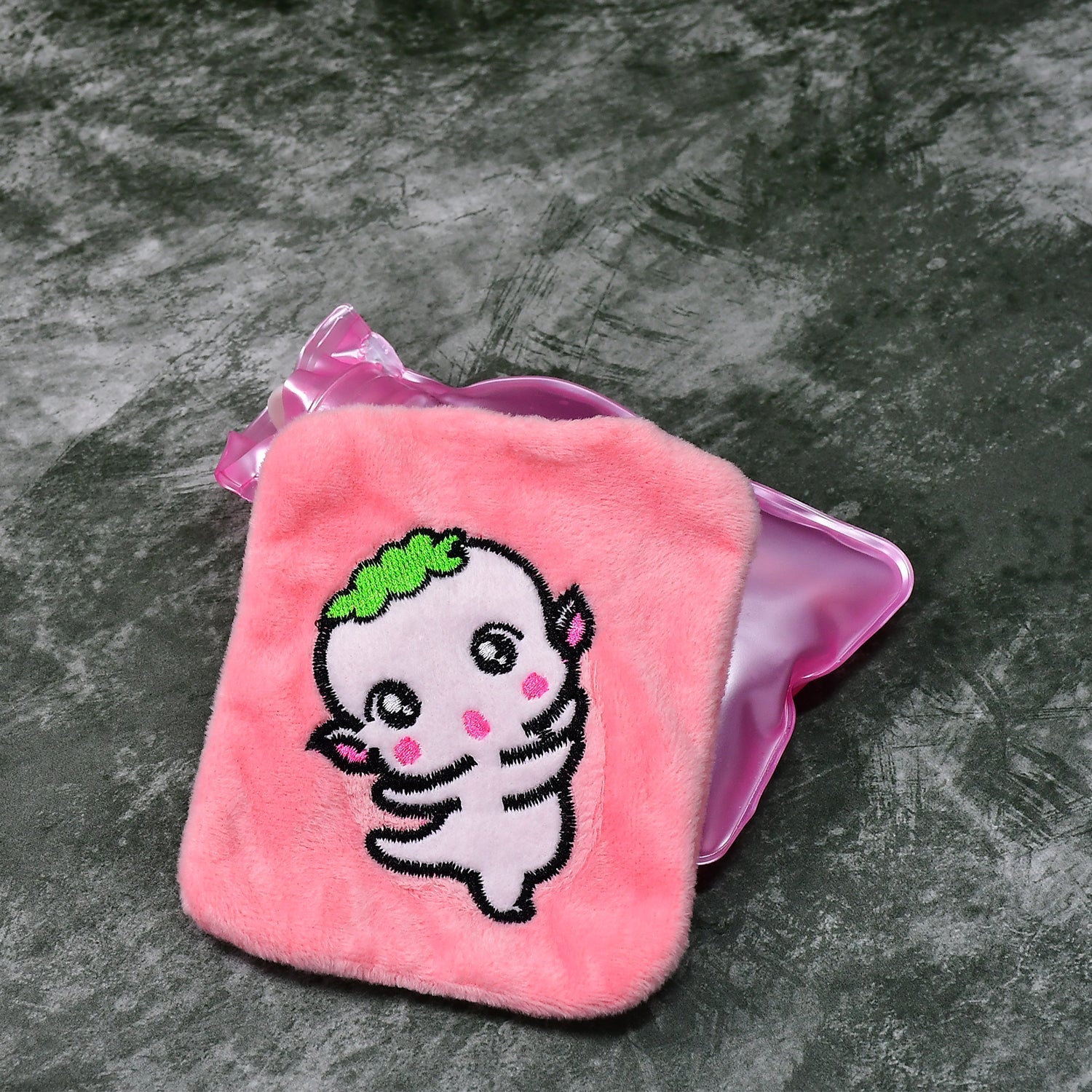 Detailed view of the cute cartoon design on the Pink Hot Water Bag cover.