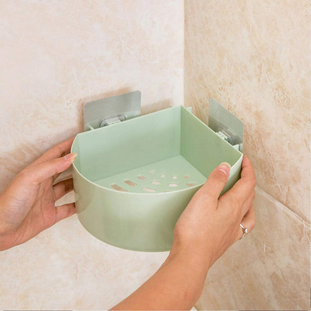 Self adhesive corner shelf installed in a modern bathroom.