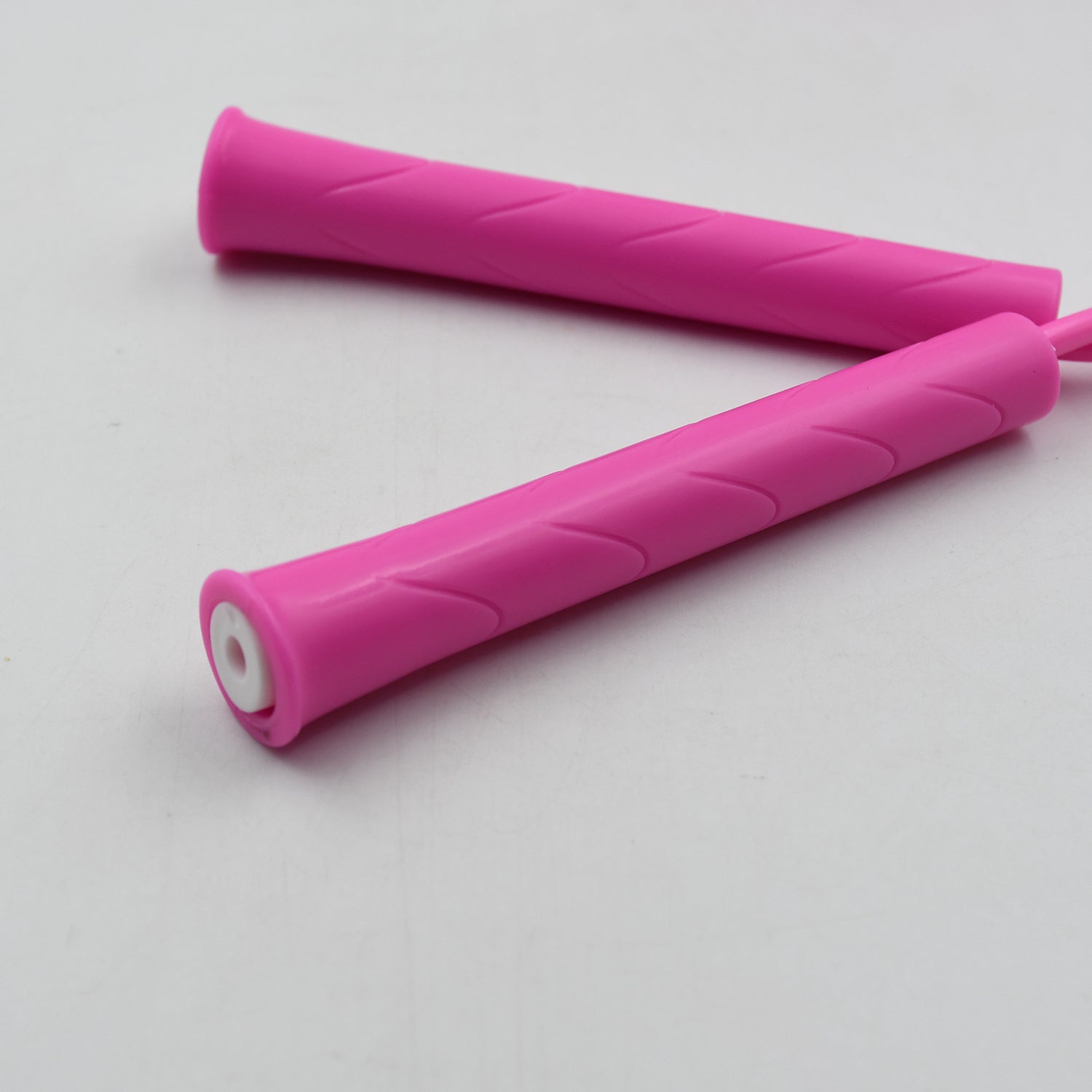 Adjustable jump rope demonstrating length customization for various user heights.