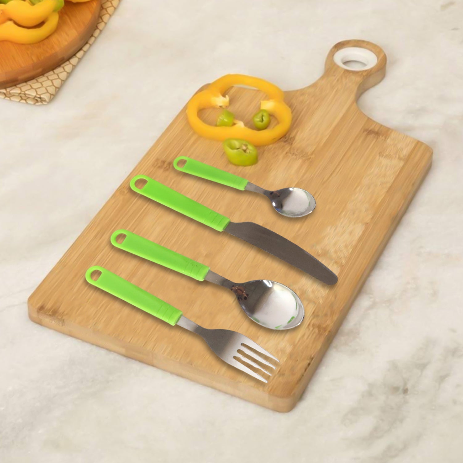 Dining table set featuring stainless steel cutlery for daily use
