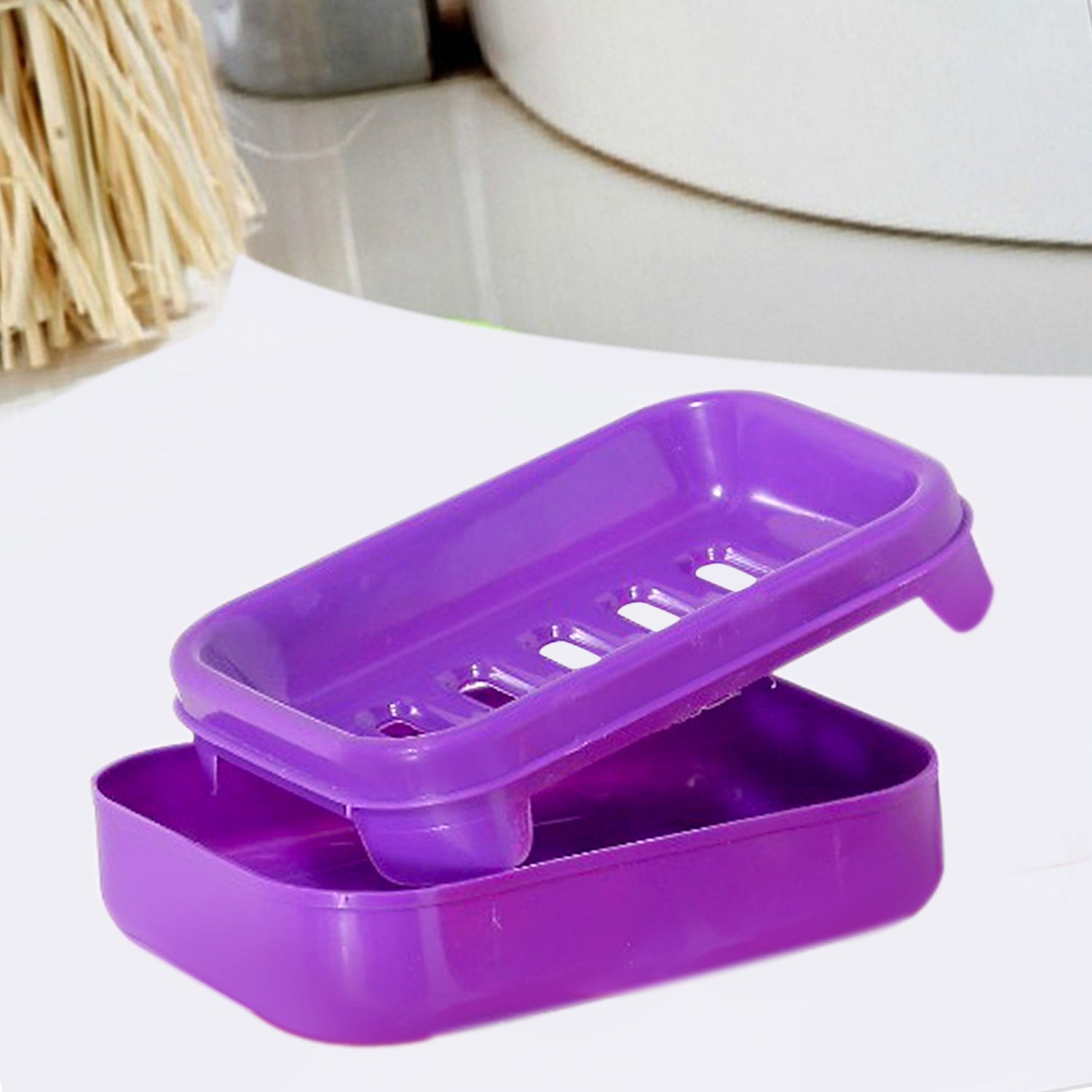 A stylish covered soap case placed on a modern bathroom countertop.