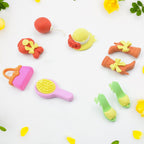 Colorful 3D mini erasers in various fun designs like animals, food, and everyday objects.