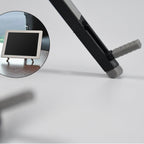 An adjustable mobile holder securely supporting a smartphone for hands-free viewing.