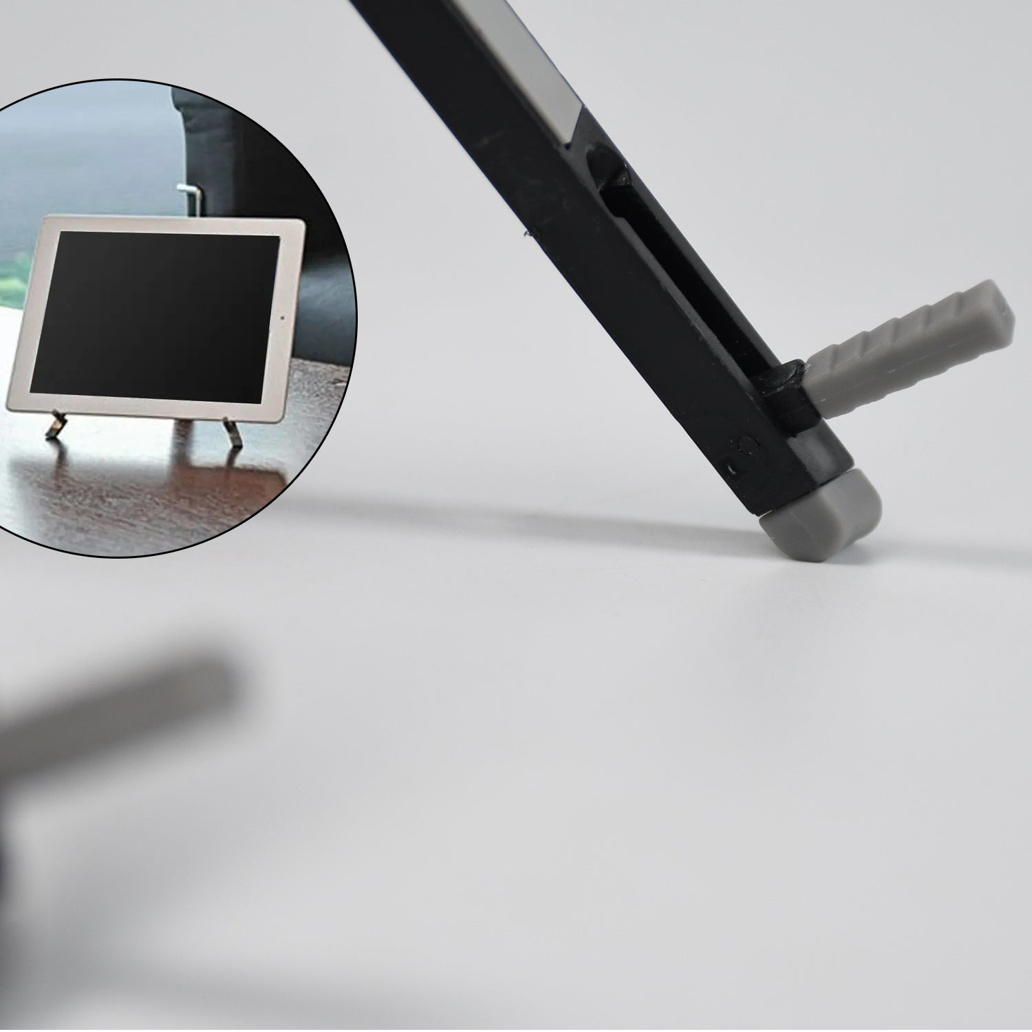 An adjustable mobile holder securely supporting a smartphone for hands-free viewing.