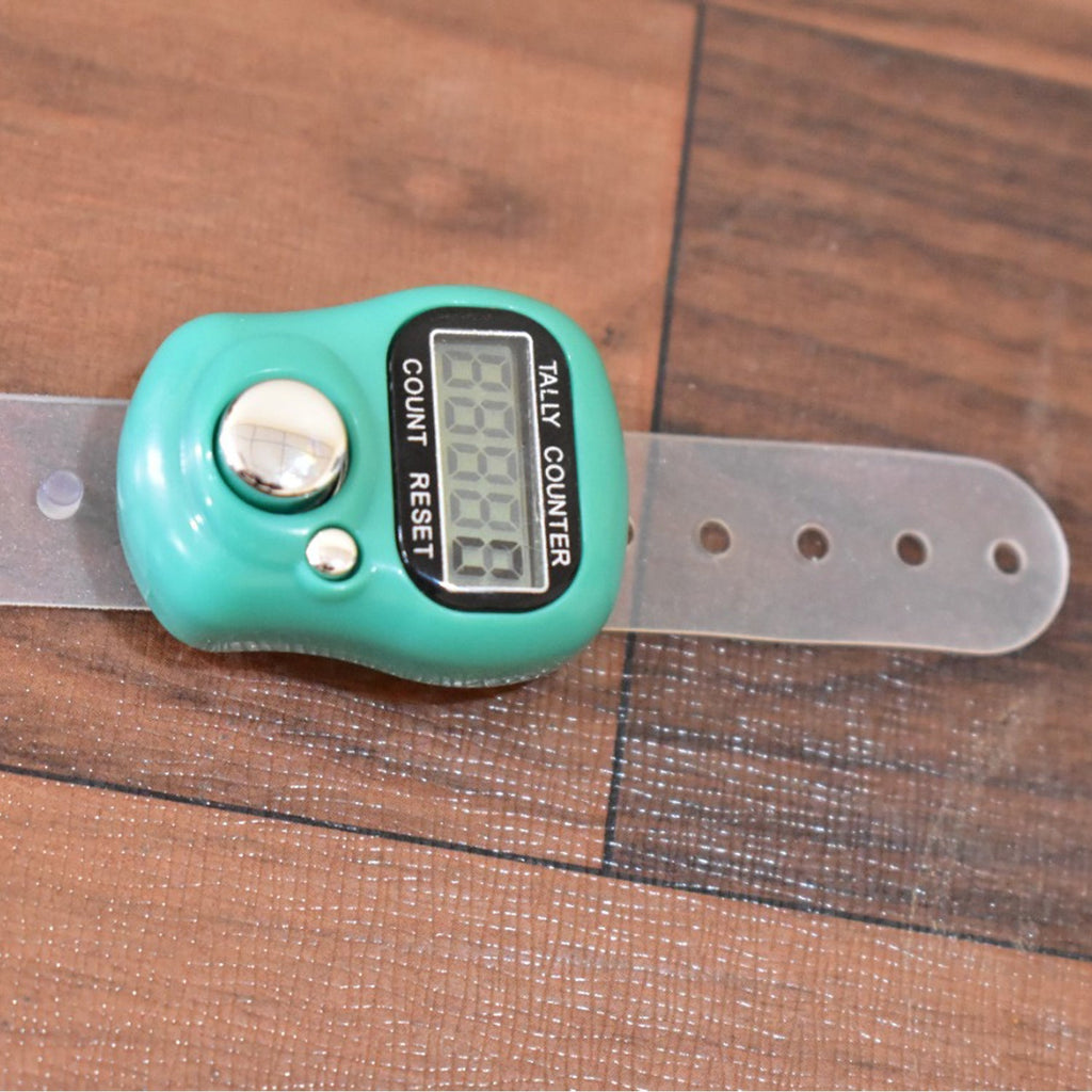 Multiple digital finger counters in various colors, showcasing portability.