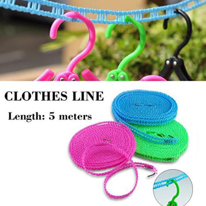 Compactly folded nylon clothesline with hooks, ready for travel or storage.