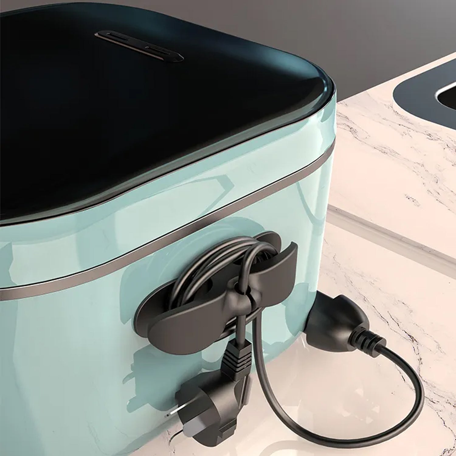 Durable cable winder managing multiple power cords for a cleaner, organized counter space.