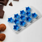 Assorted silicone mold featuring star, heart, and other fun shapes for ice or candy making.