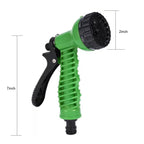 Close-up of the water spray gun nozzle with flow control lever.