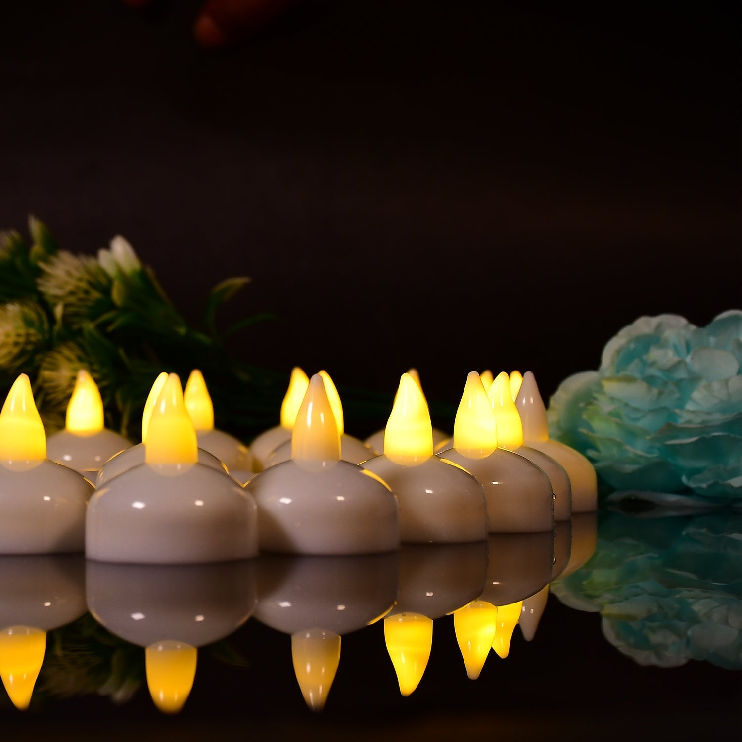Decorative floating candles set, ideal for festive occasions.