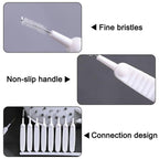 The multifunctional brush set shown cleaning small holes of a shower head.