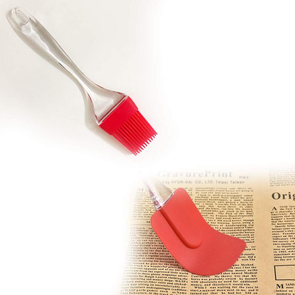 Durable silicone spatula and brush, ideal for cake mixing.