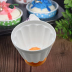 Stack of two dessert molds with lids, demonstrating their compact storage.