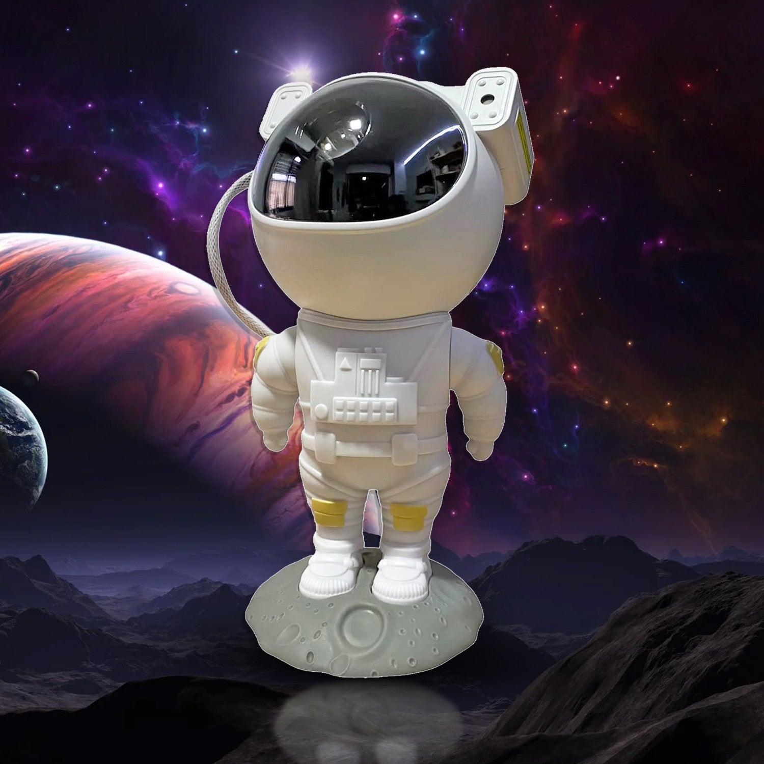 Astronaut galaxy projector with remote control on a wooden surface, ready to use.