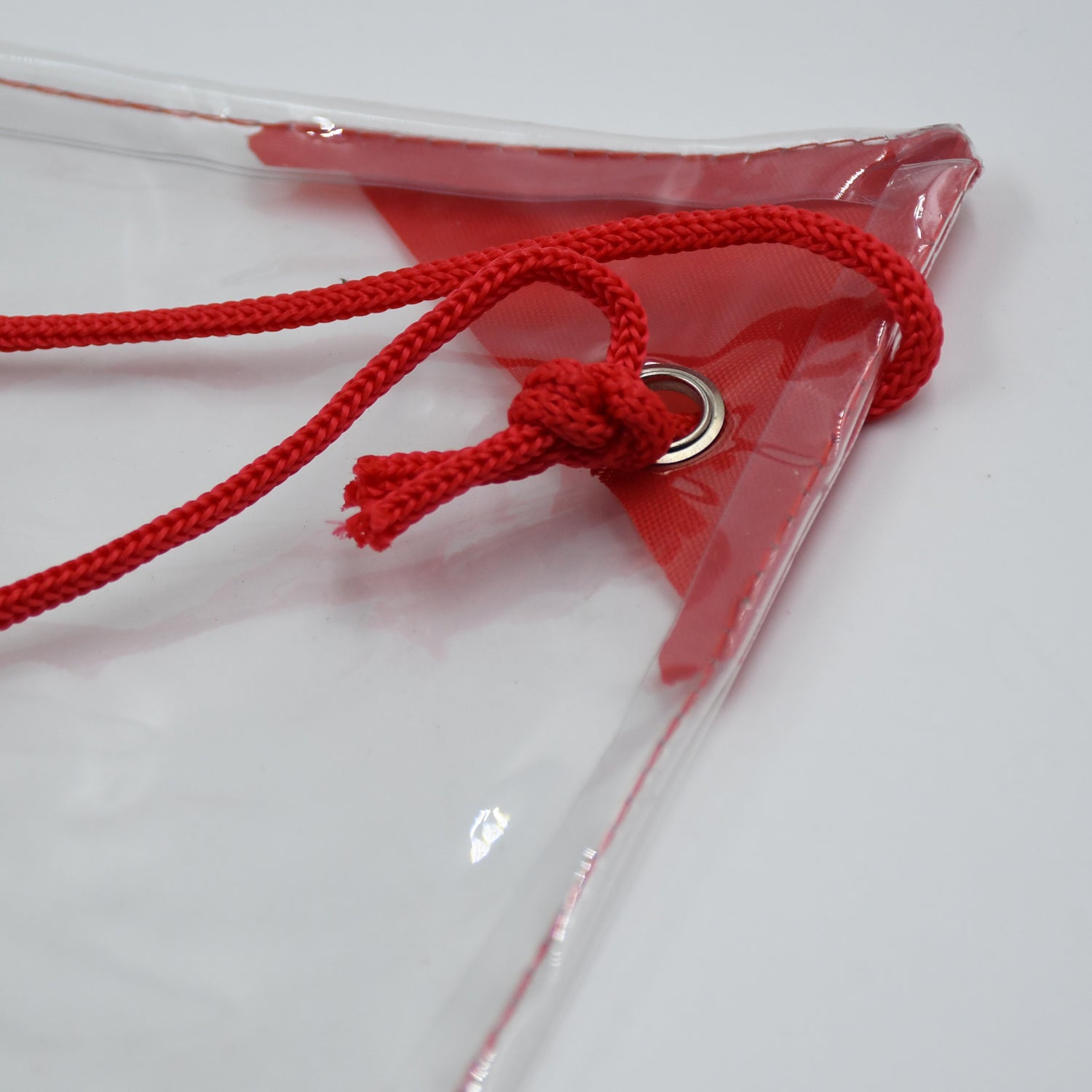 ClassiCarry clear plastic pouch, waterproof and perfect for concerts, sports, and travel.