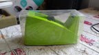 Angled shot of the durable plastic tape cutter, perfect for home and e-commerce use.
