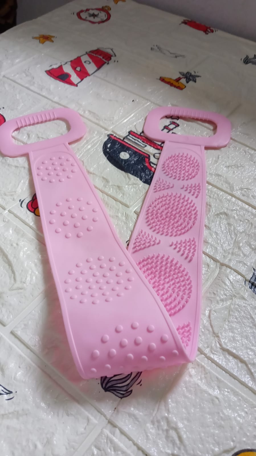 Environmentally friendly silicone back scrubber towel ready for use.