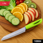 Close up of kitchen utility knife showing sharp stainless steel blade and ergonomic handle