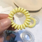 Close-up of spiral hair rubber band showing flexible design
