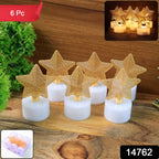 Close-up of a flameless LED star candle with intricate golden mesh topper
