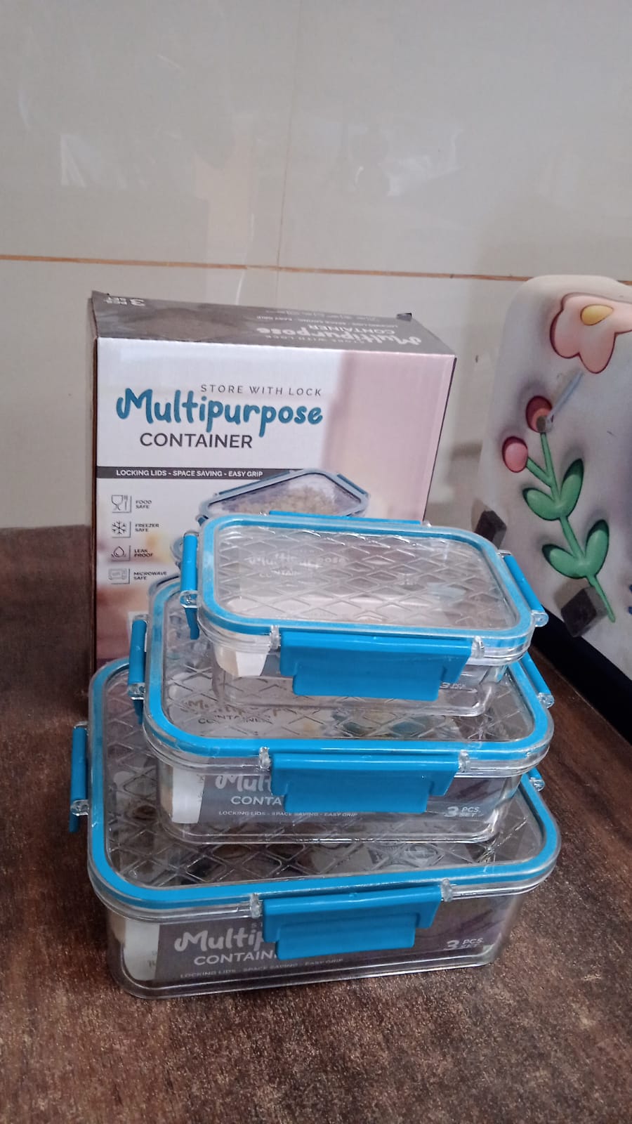 Vertical view of multipurpose plastic food storage containers set with lids