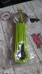 ChefAura fruit baller and scooper set in a vibrant kitchen setting with assorted fruits.