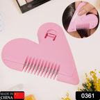White plastic hair cutting comb with fine and wide teeth.
