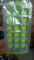 A single green 18-cavity silicone ice cube tray, showcasing its bright color and design.