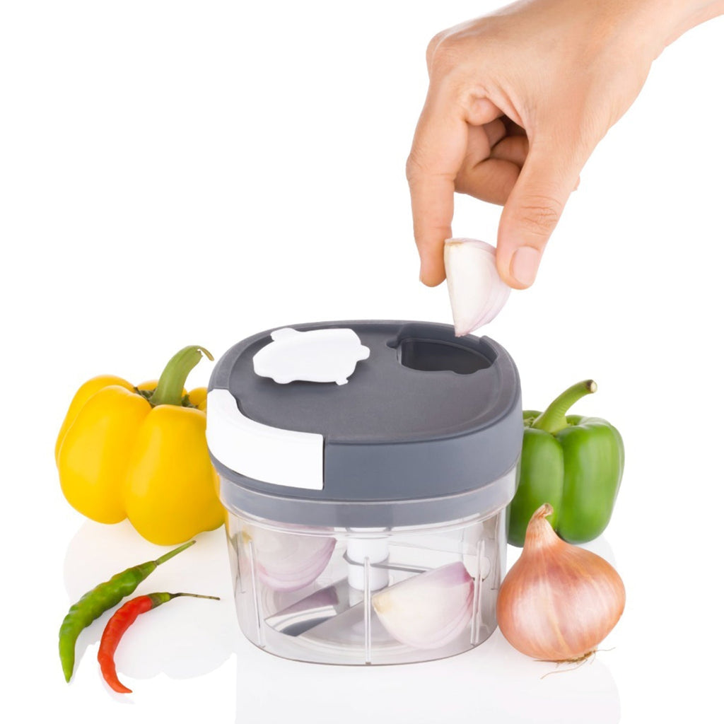 Sharp, smooth stainless steel blades of the vegetable chopper for precise cuts.