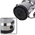 Side view of the ChefAura mini stainless steel grinder, showcasing its compact design.