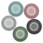 Versatile floor drain cover in white, suitable for various bathroom and toilet settings.