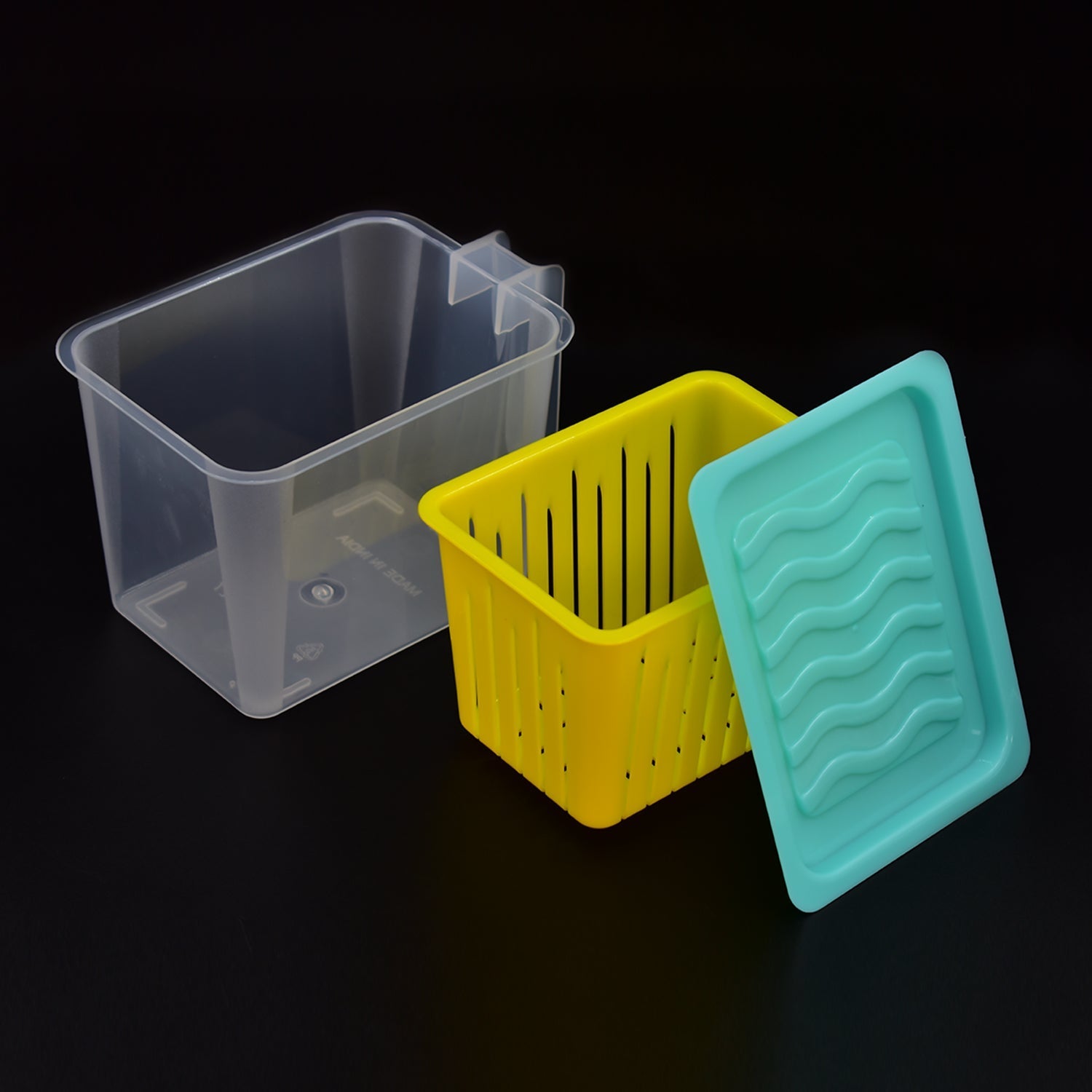 Easy-access plastic storage containers with handles, ideal for pantry and kitchen organisation.