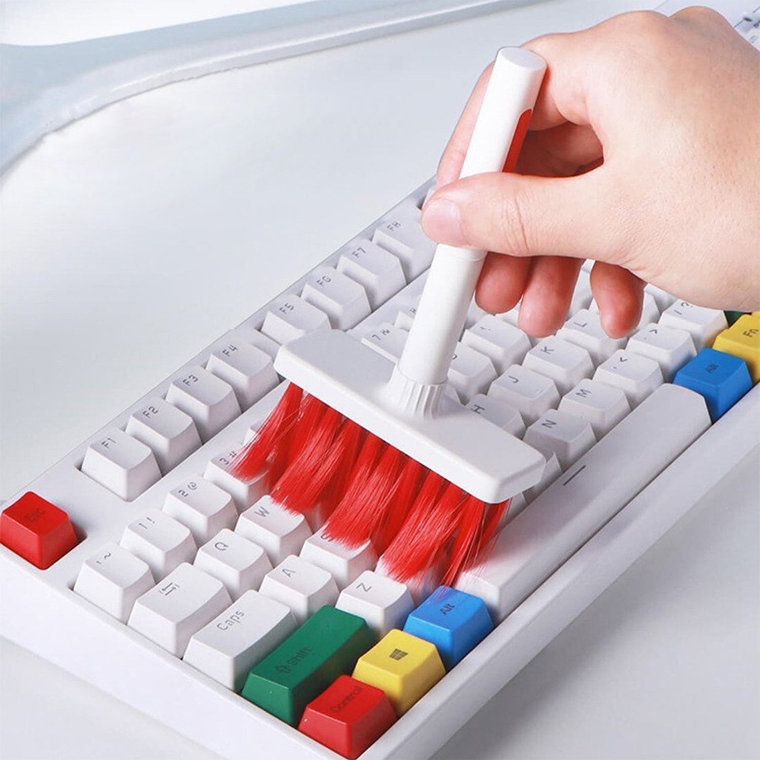 Dustiva 5-in-1 computer cleaning kit with various brushes and tools.