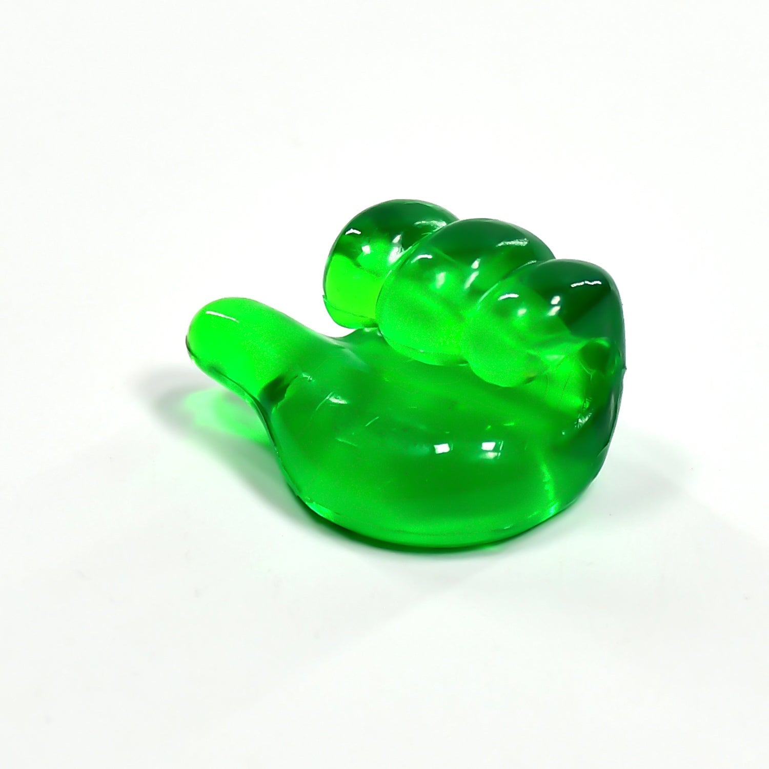 An overhead view of several hand shape wall clips showcasing their compact size.