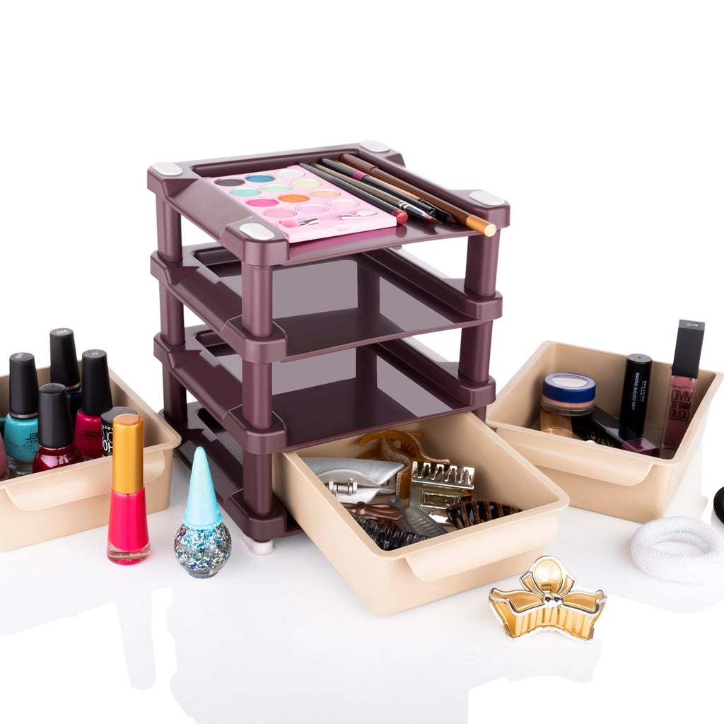 Lifestyle shot of the multi-layered makeup organizer on a dresser.