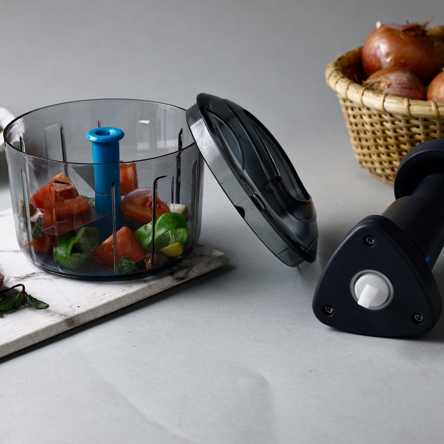 Push chopper featuring secure lock mechanism, ideal kitchen tool