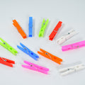 Vibrant set of 144 multi-purpose plastic clothes clips for laundry.