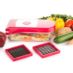 Ganesh red vegetable and fruit chopper disassembled, displaying all its components.