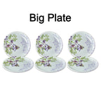 High-quality 32-piece plastic tableware set displayed on a table.