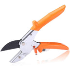 Garden scissors shown in use, making a clean cut on a plant stem.
