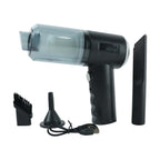Third additional view, demonstrating the portable nature of the vacuum.