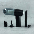 Close-up of the Mini Car Vacuum's nozzle and brush attachments.