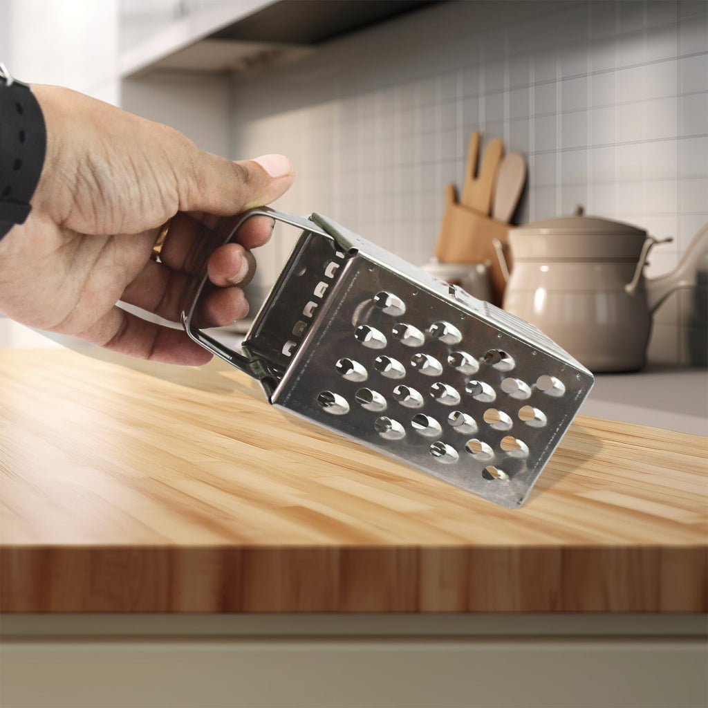 Close-up details of stainless steel blades on 4-in-1 grater and slicer