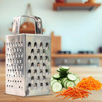 Compact 4-in-1 stainless steel grater and slicer on white background
