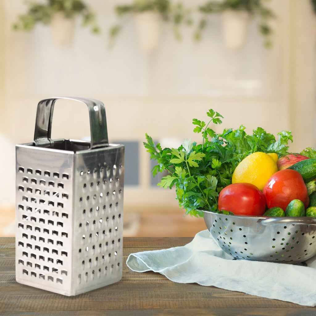 Multi-surface stainless steel vegetable grater with sharp blades
