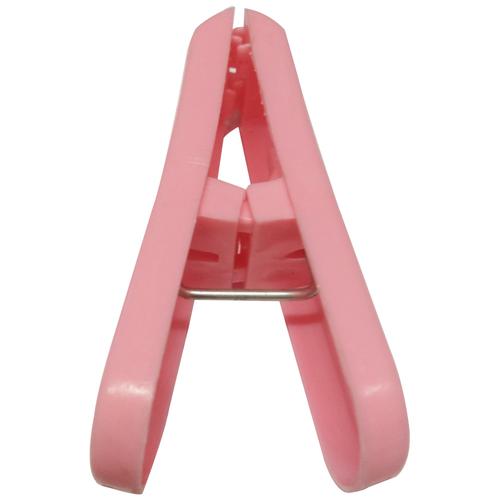 Durable plastic cloth drying clips in vibrant red, green, yellow, and blue.