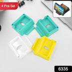 Close-up of plastic mobile phone stand holder showing cable slot